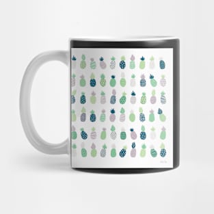 Pineapples in blue and greenery Mug